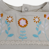 Baby Girls Cotton Romper – Beige with Floral Design