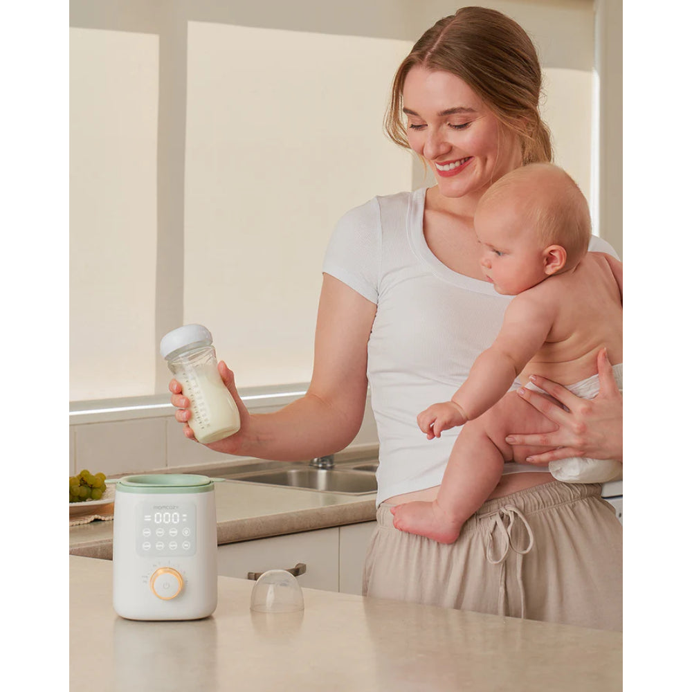جهاز تدفئة زجاجات الأطفال Nutri من Momcozy