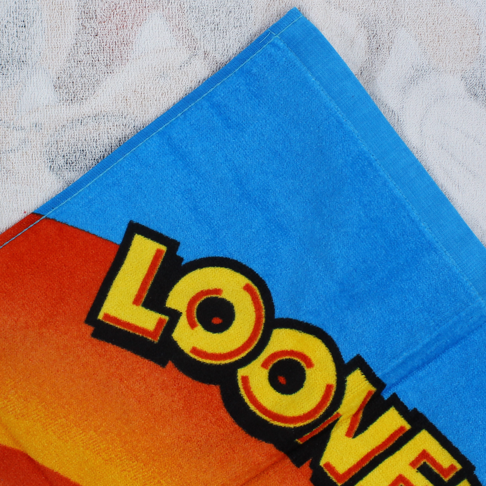 Boys Beach Towel – Blue with Looney Tunes Print (60×120 cm)