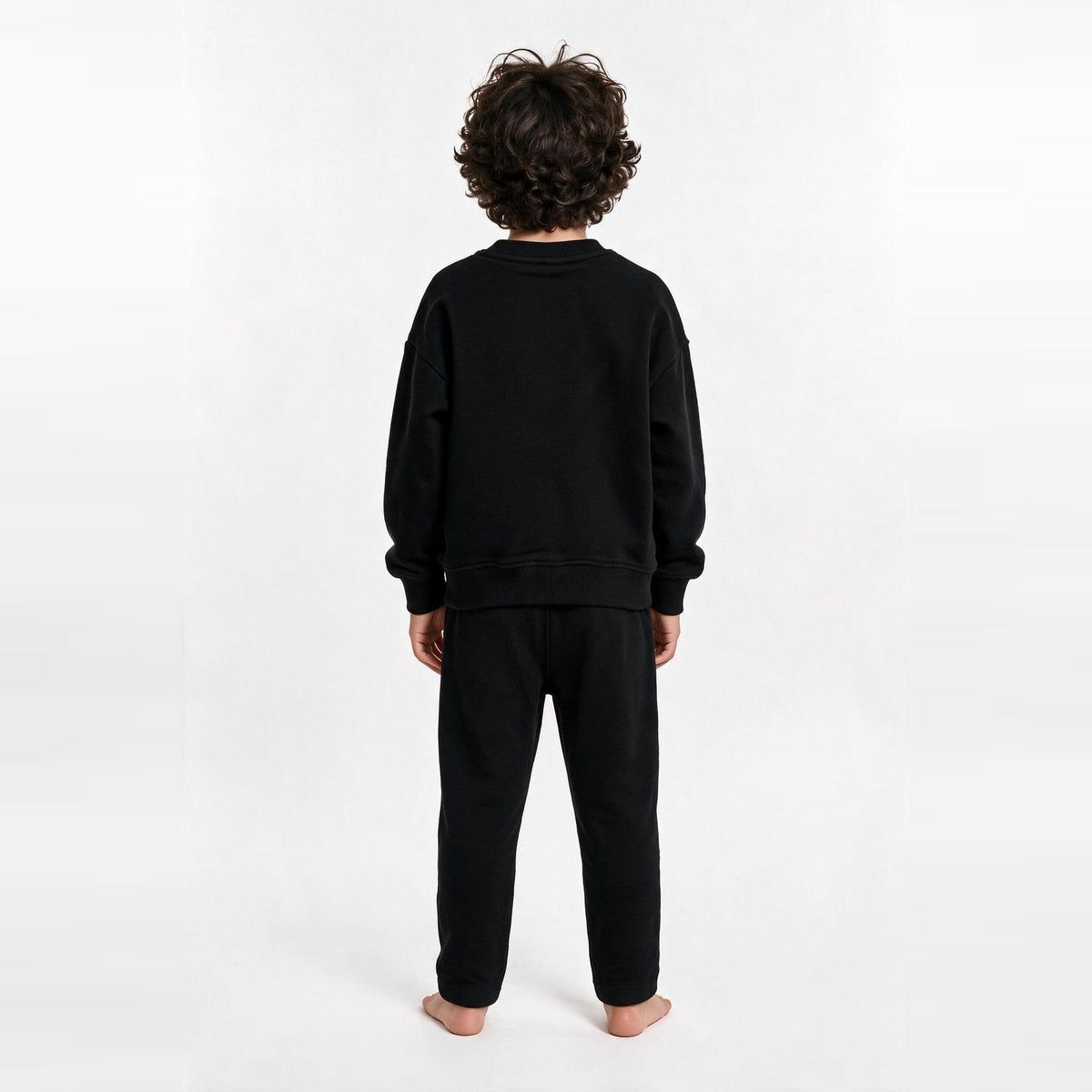Unisex Cotton Milton Sweatpants – Black — on model, back 1