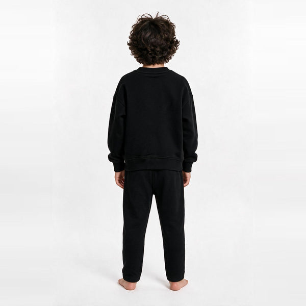 Unisex Cotton Milton Sweatpants – Black — on model, back 1