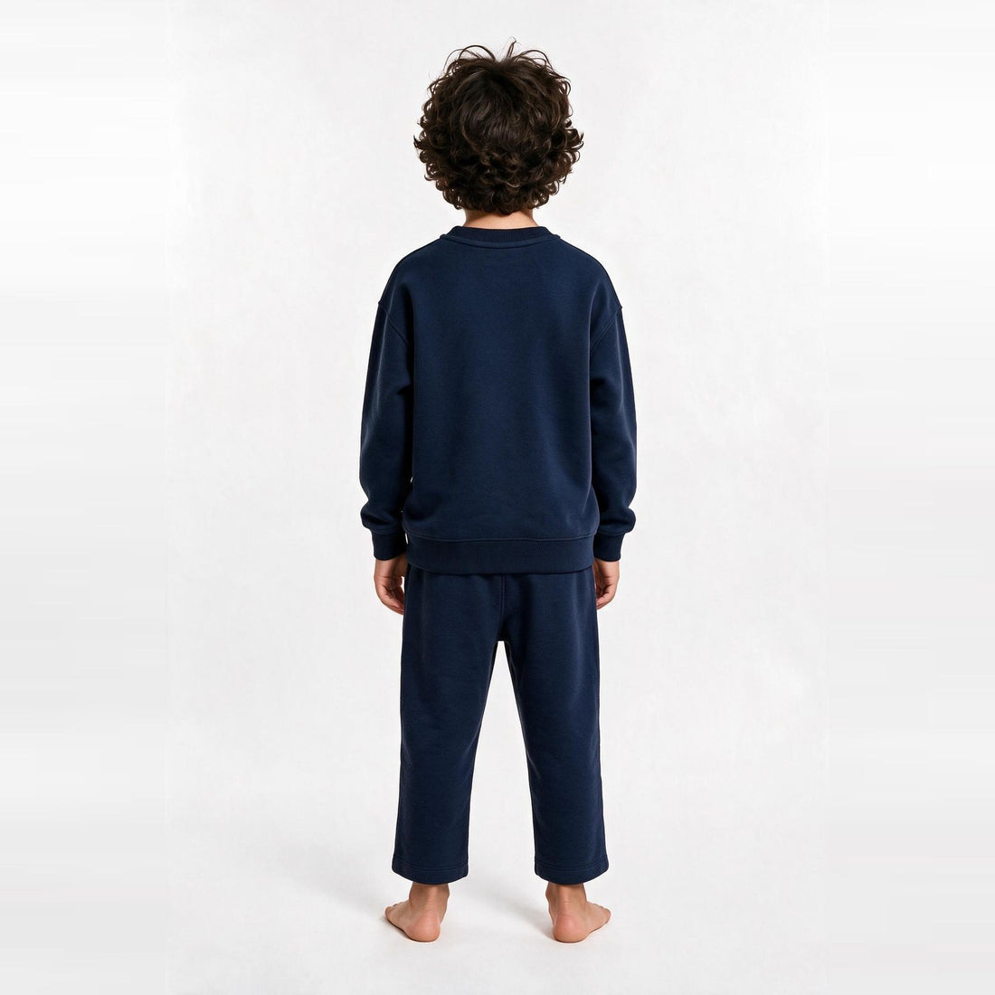 Unisex Cotton Milton Sweatpants – Navy — on model, back 1