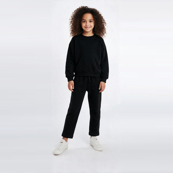 Unisex Cotton Milton Sweatpants – Black — on model 2