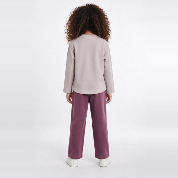 Girls Long-Sleeved Pajama – Dusty Pink with "Beauty Is In You" Print – on model, back